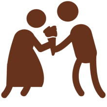 Silhouette figures exchanging bouquet on black background.